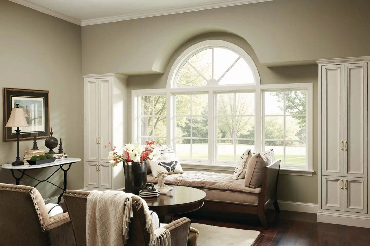 Sitting room with a bare arched window