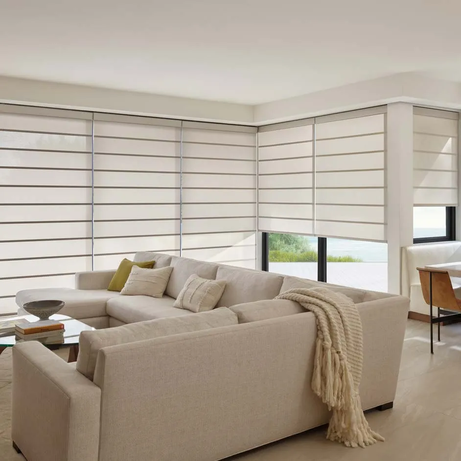 Alustra Architectural shades on a corner wall of windows in a bright living room