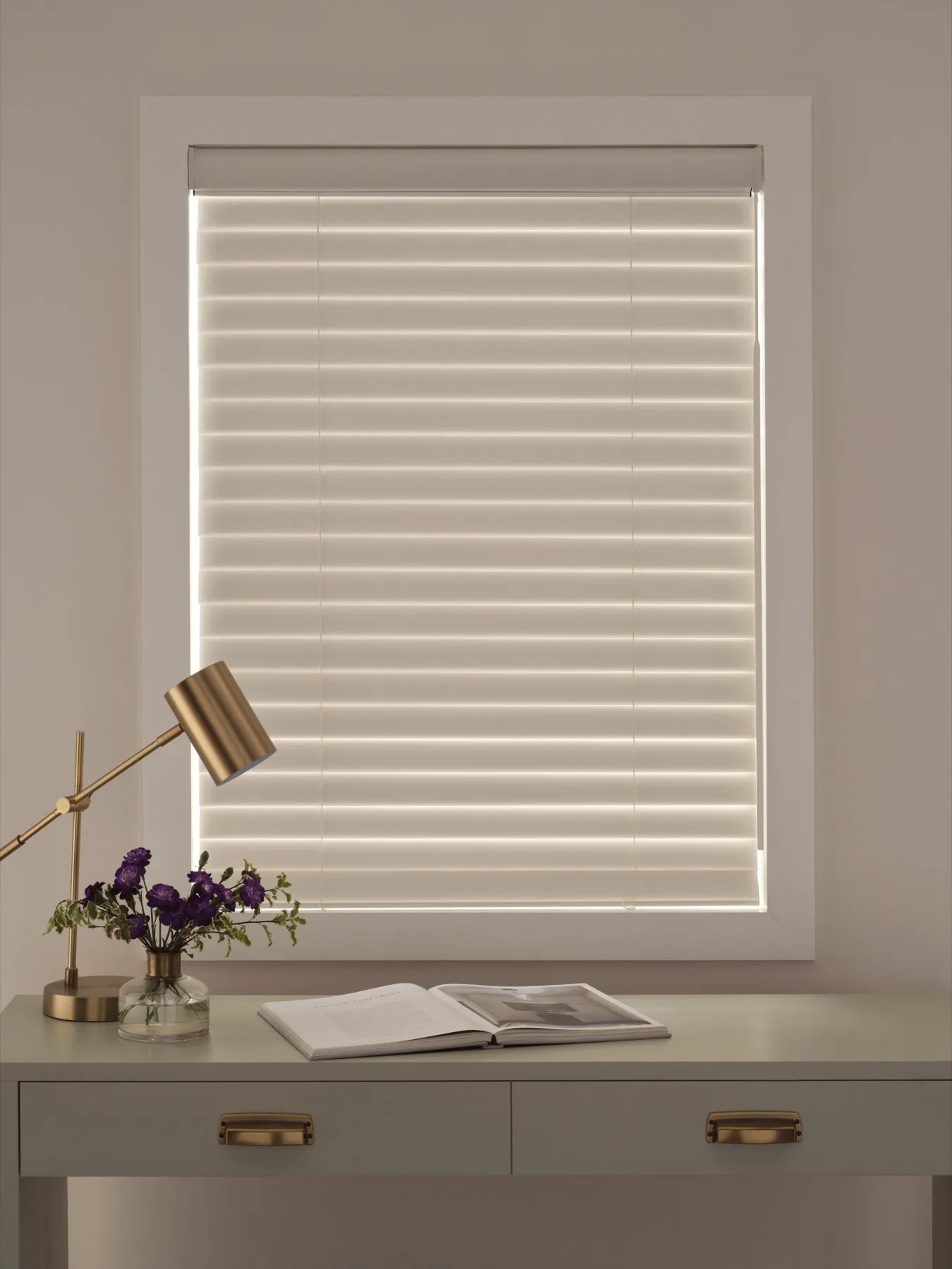 Aria™ Soft Blinds with the fabric vanes tilted open above a desk