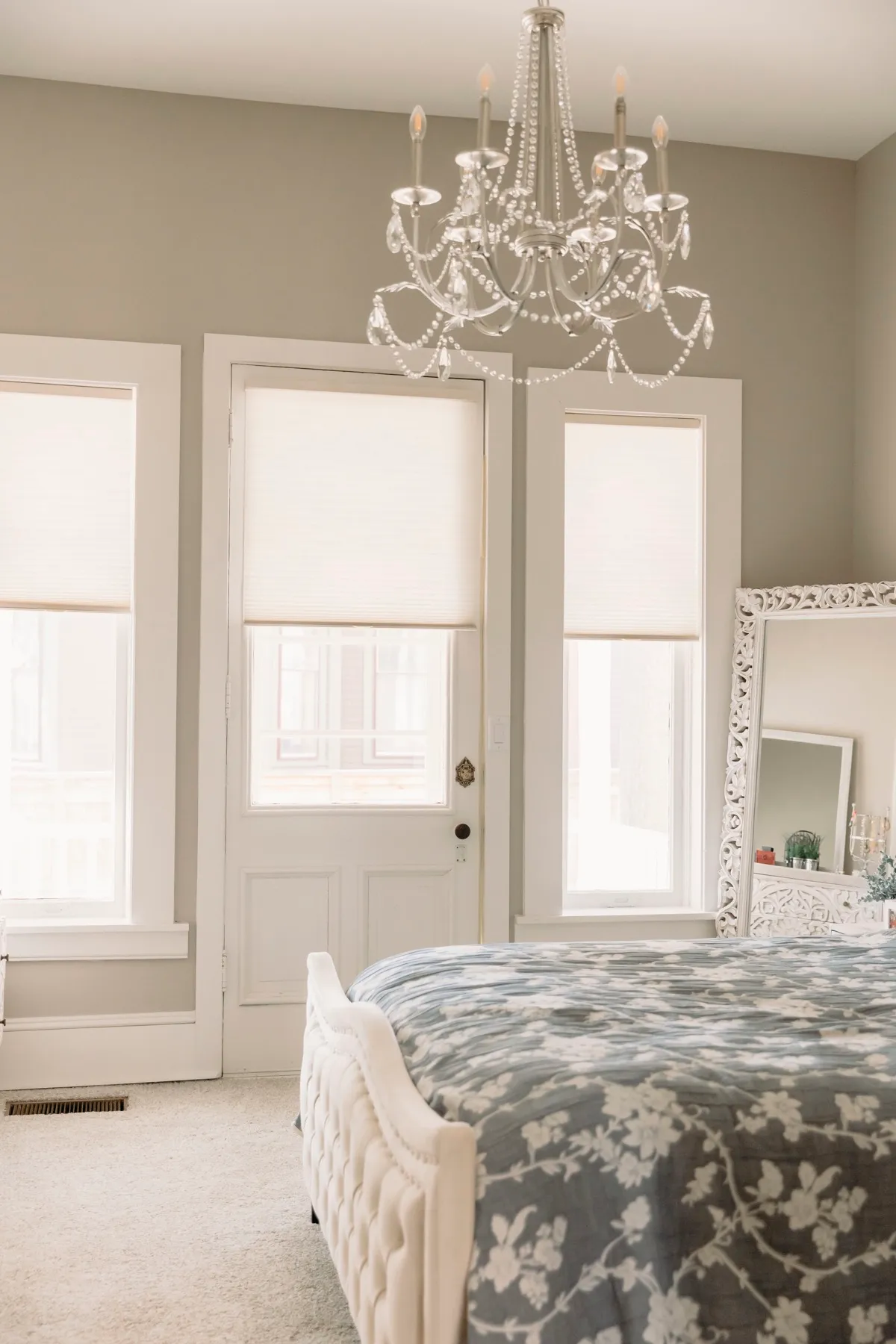 Bedroom door and windows with matching cellular shades