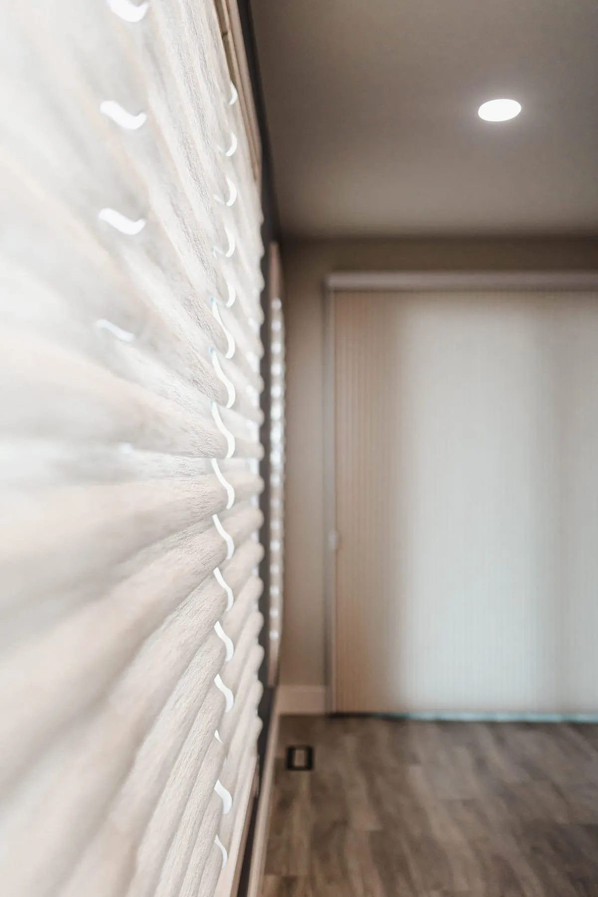 Soft shades on a corner window