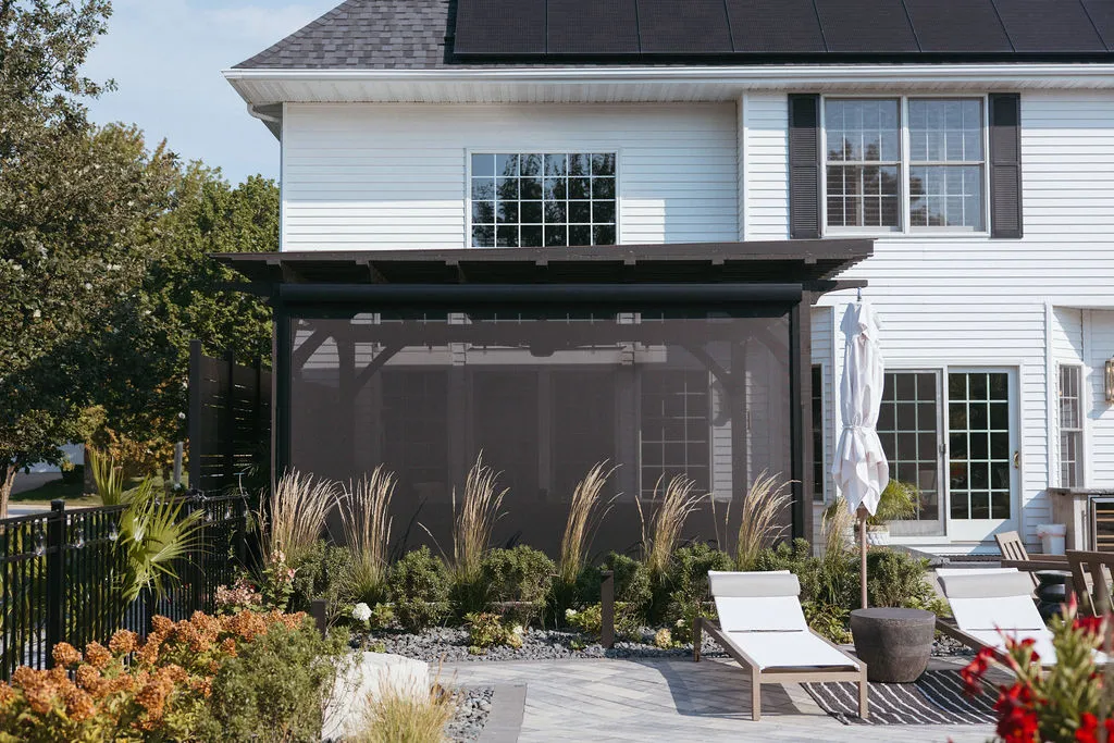 Screened pergola seen from across the patio