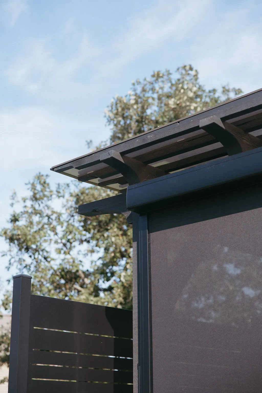 Close-up of the MagnaTrack screen housing on the pergola