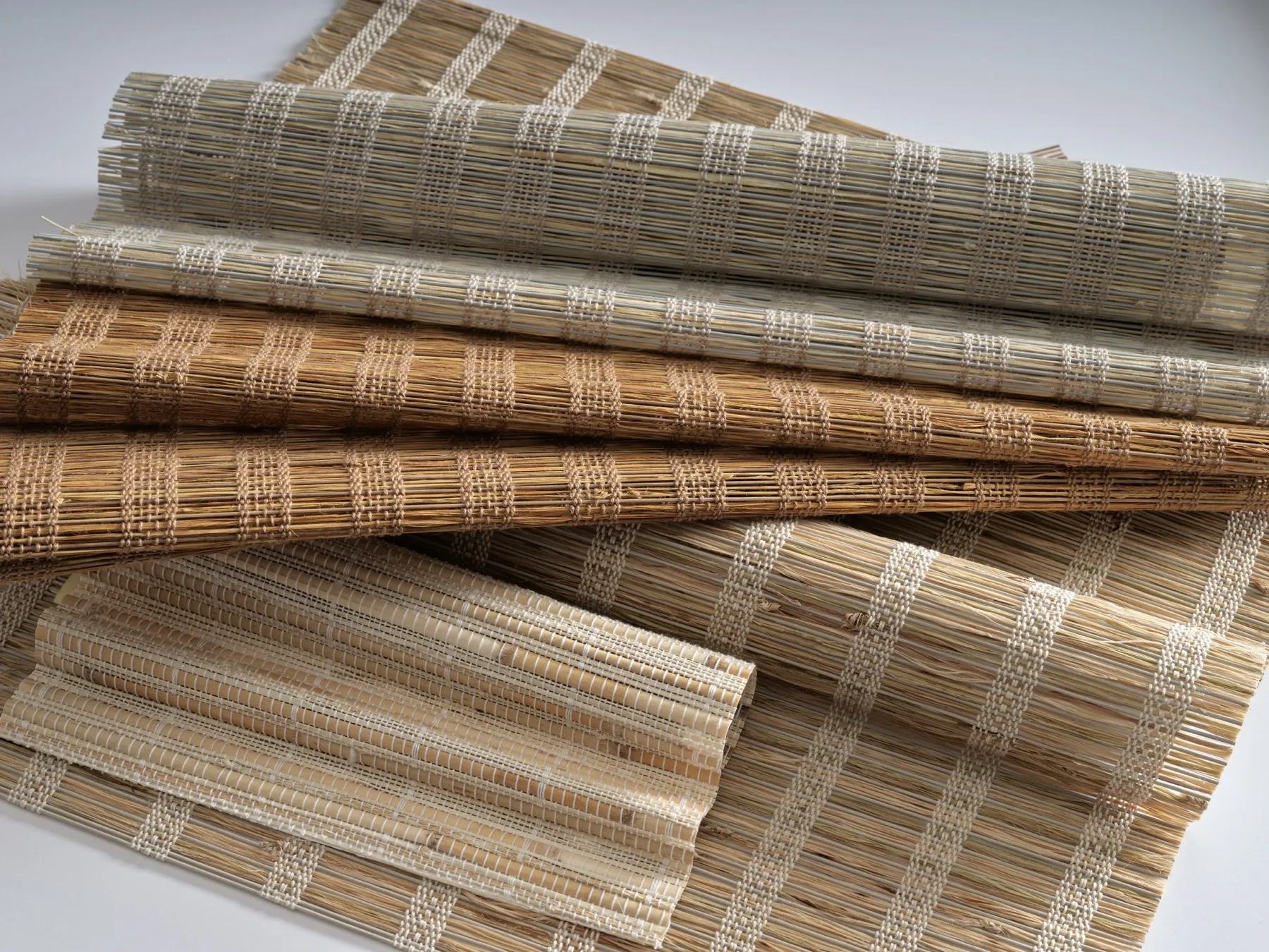 Rolled samples of Provenance® natural woven wood materials
